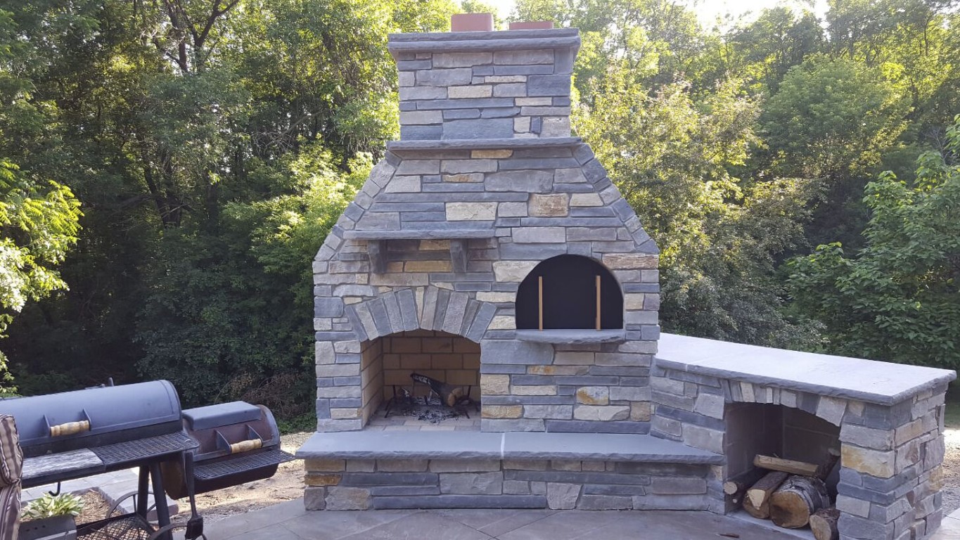 Custom outdoor fireplace and kitchen construction by masonry experts in Tuscaloosa, AL